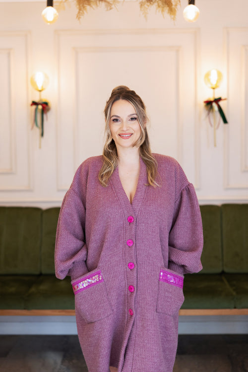 A softly structured cardigan rendered