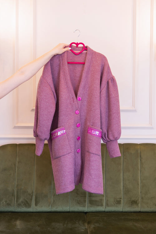 A softly structured cardigan rendered