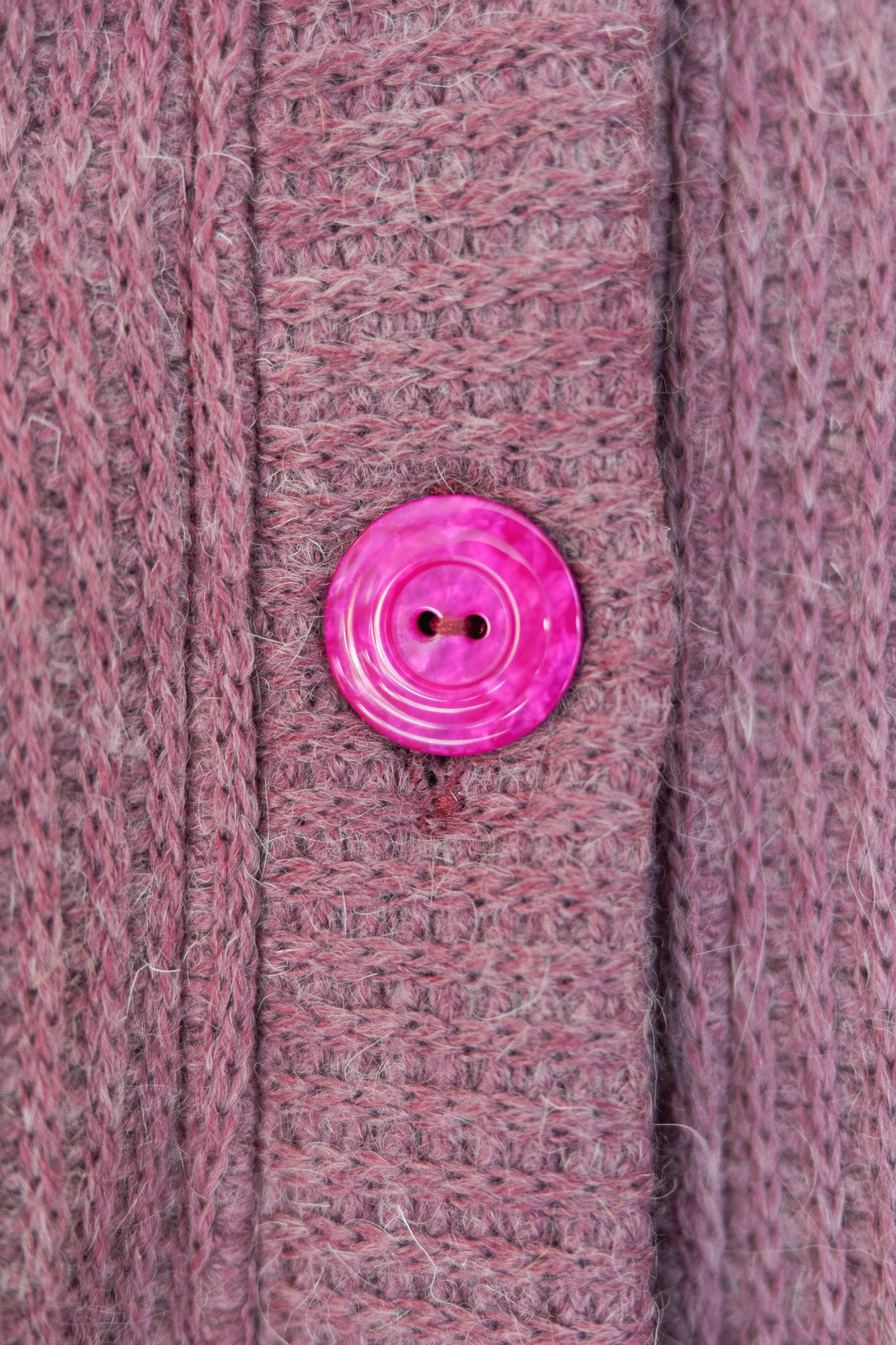 A softly structured cardigan rendered