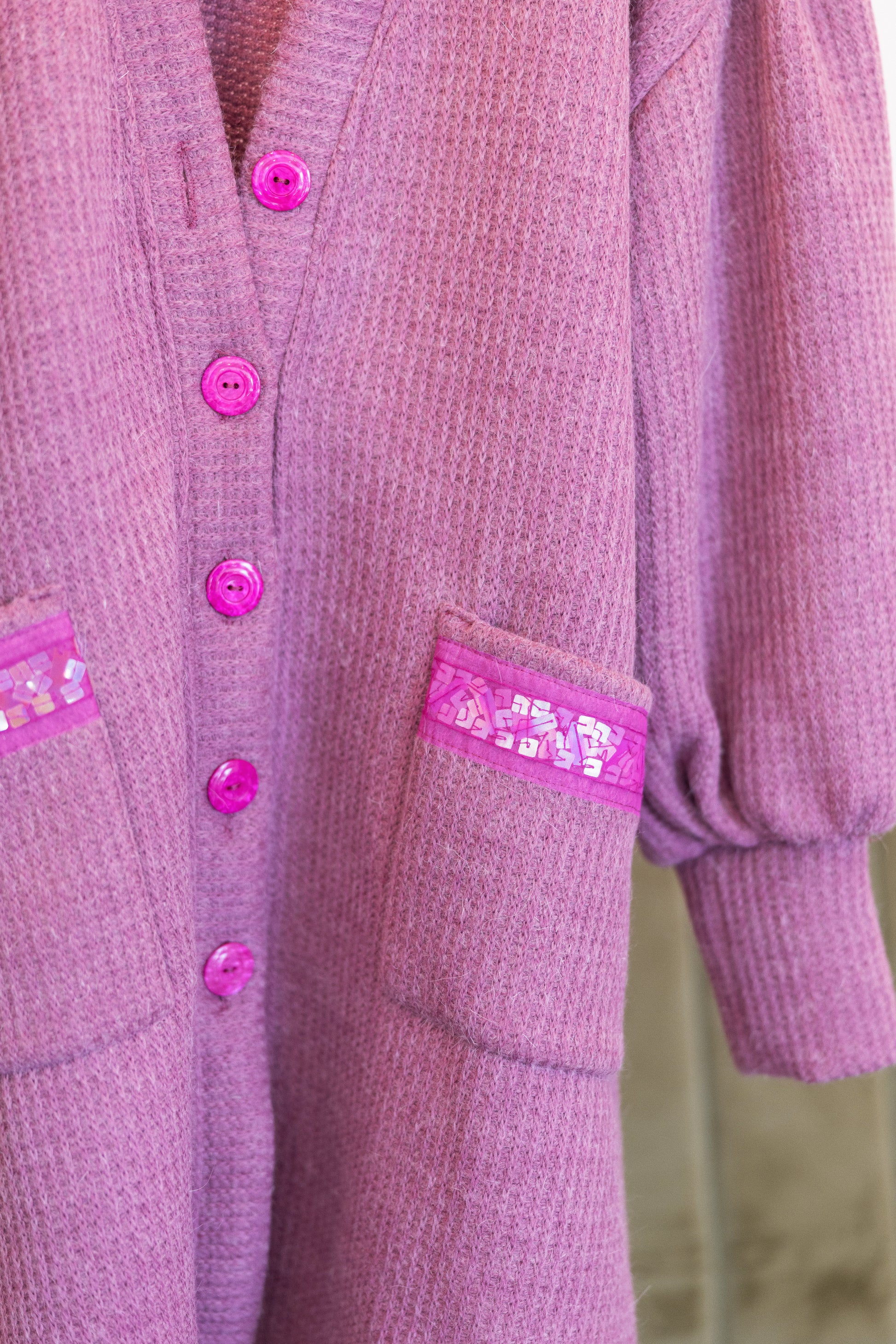 A softly structured cardigan rendered